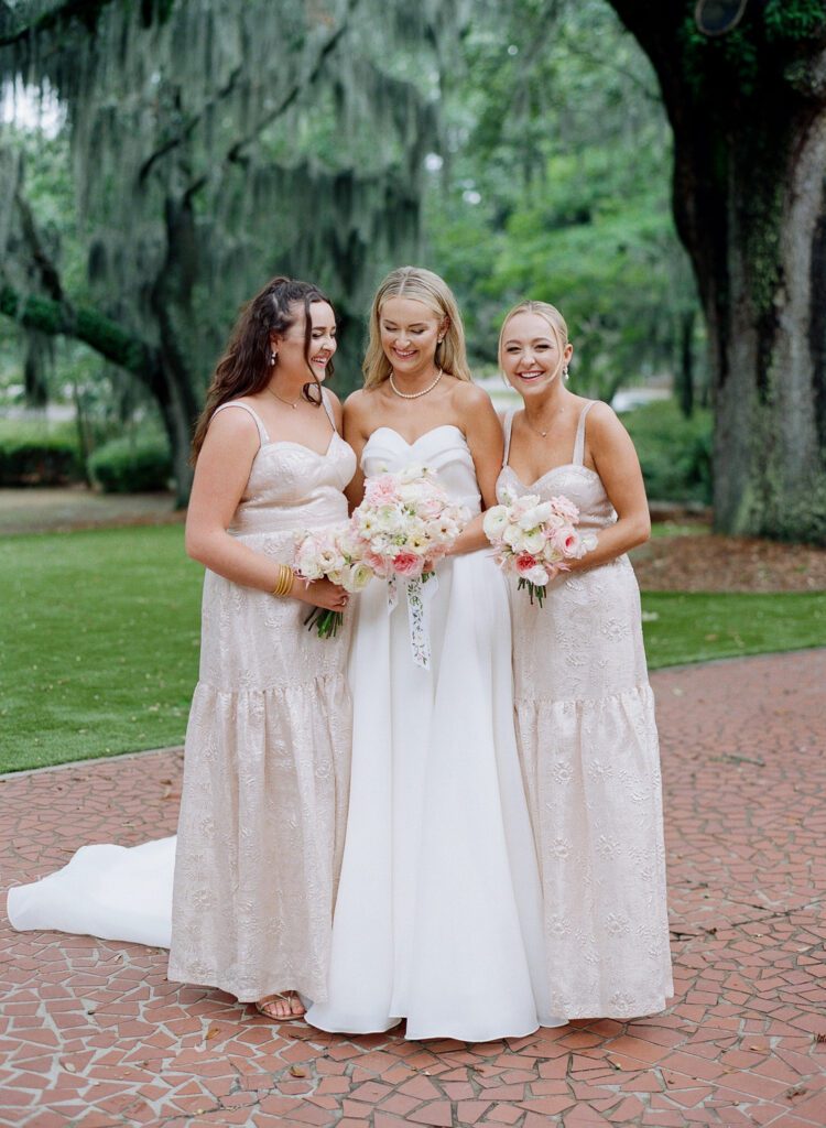 bride with sisters bridesmaids