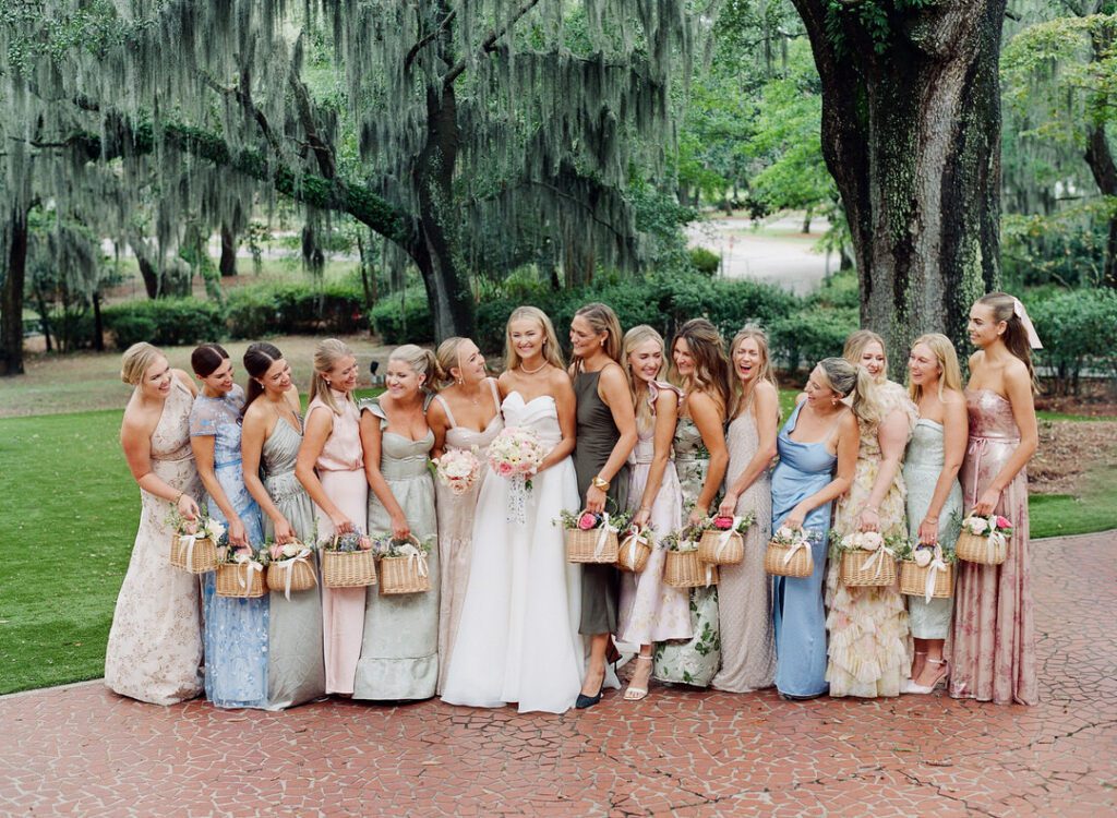 Bride with bridesmaids holding baskets