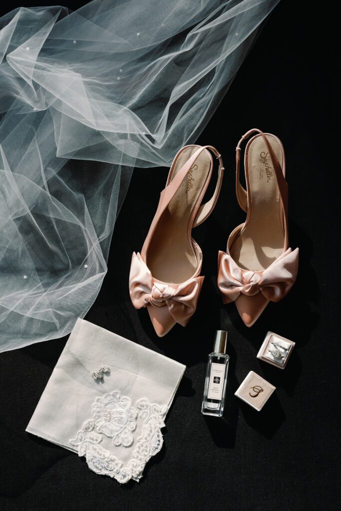 pink wedding shoes perfume and veil