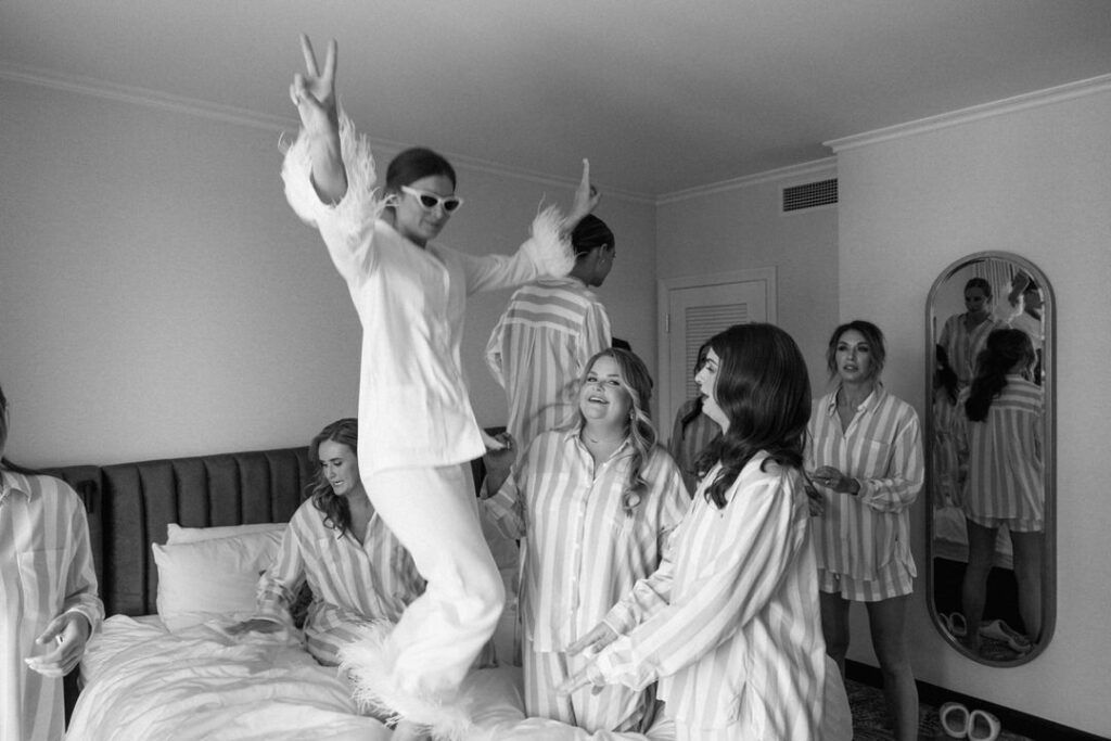 bride jumping on bed