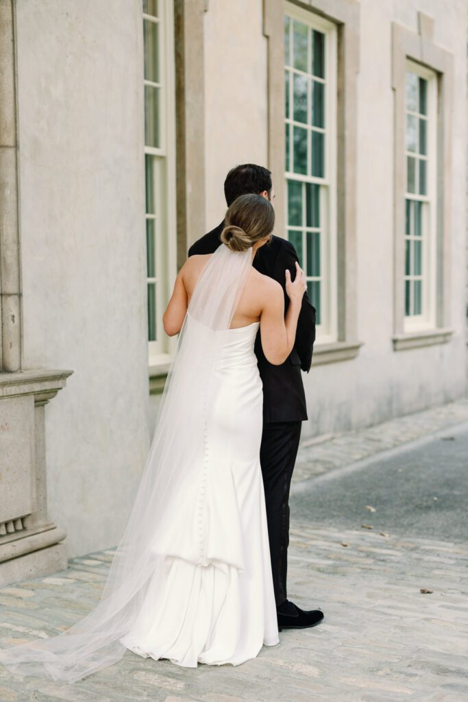 bride and groom first look at The Swan House Atlanta GA