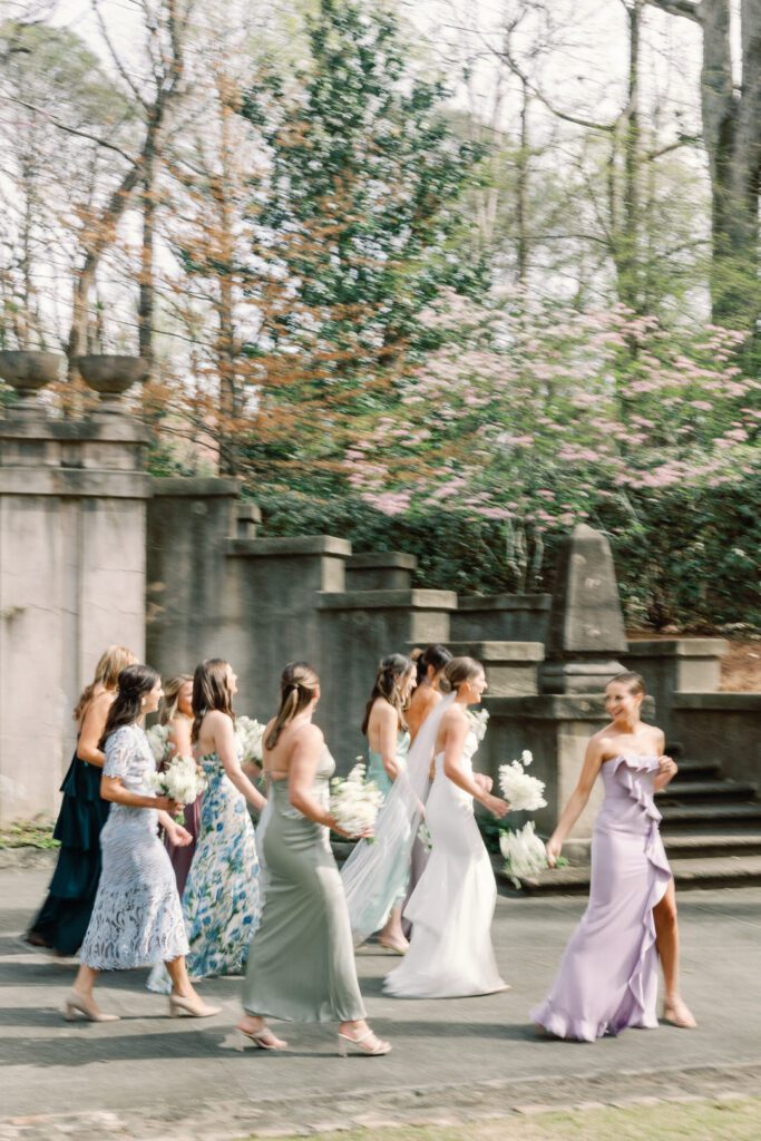 bride walking with bridesmaids