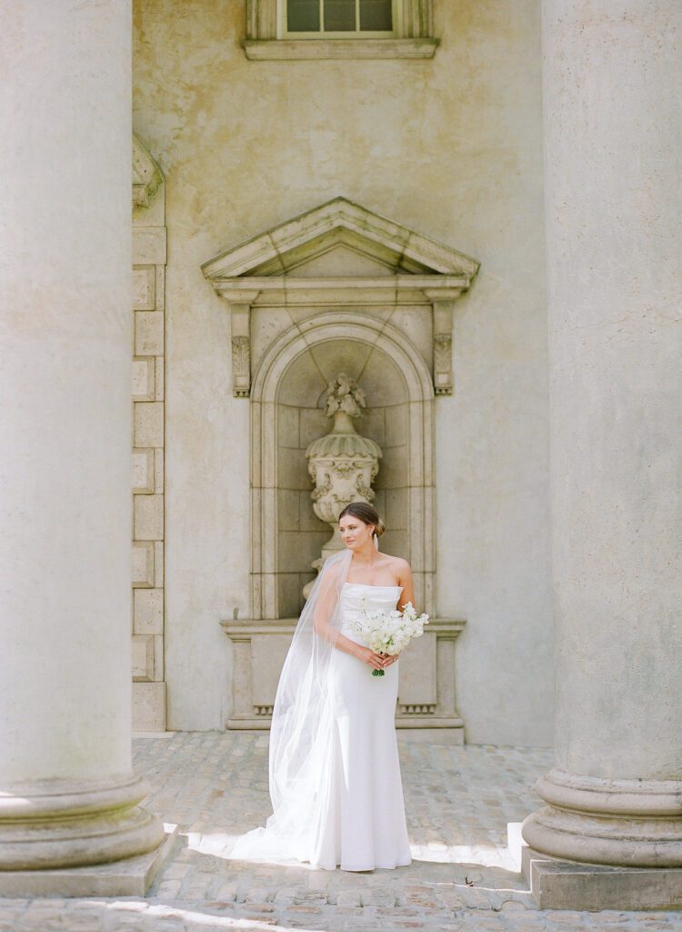 bride looking over shoulder at The Swan House Atlanta GA