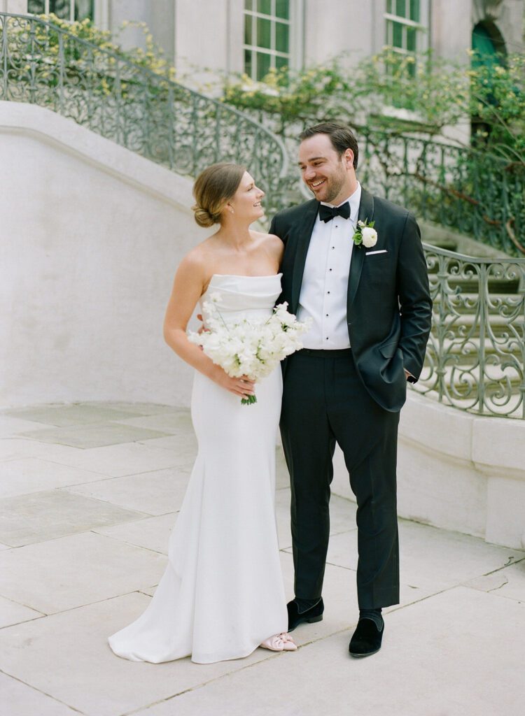 bride and groom smiling