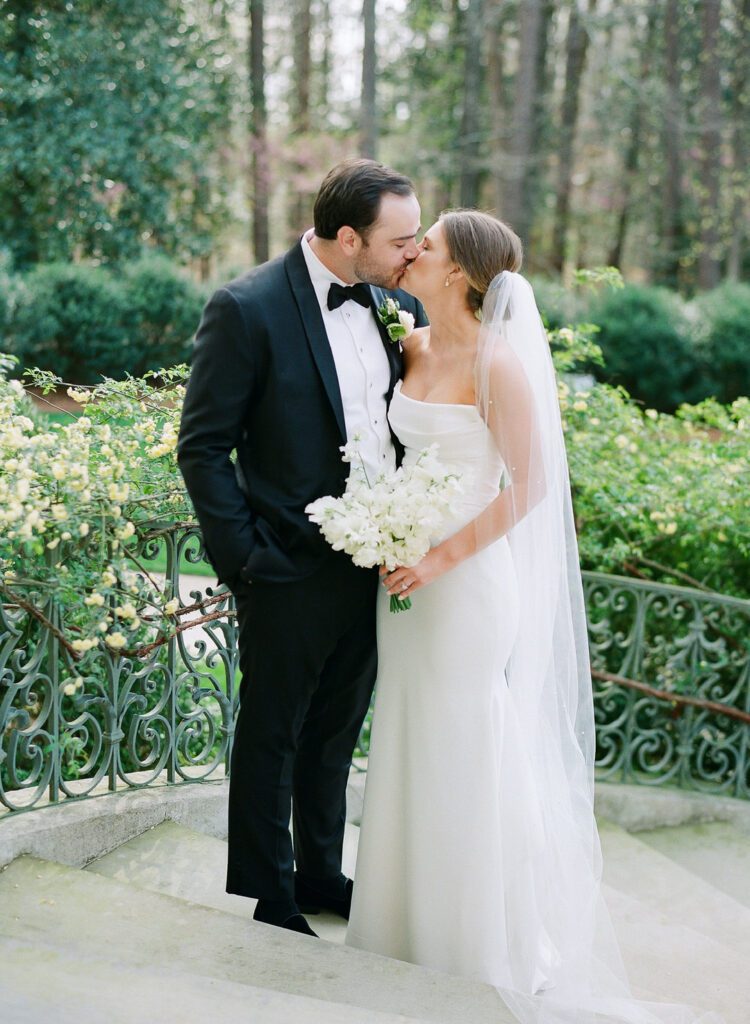 Bride and Groom kissing at The Swan House Atlanta GA