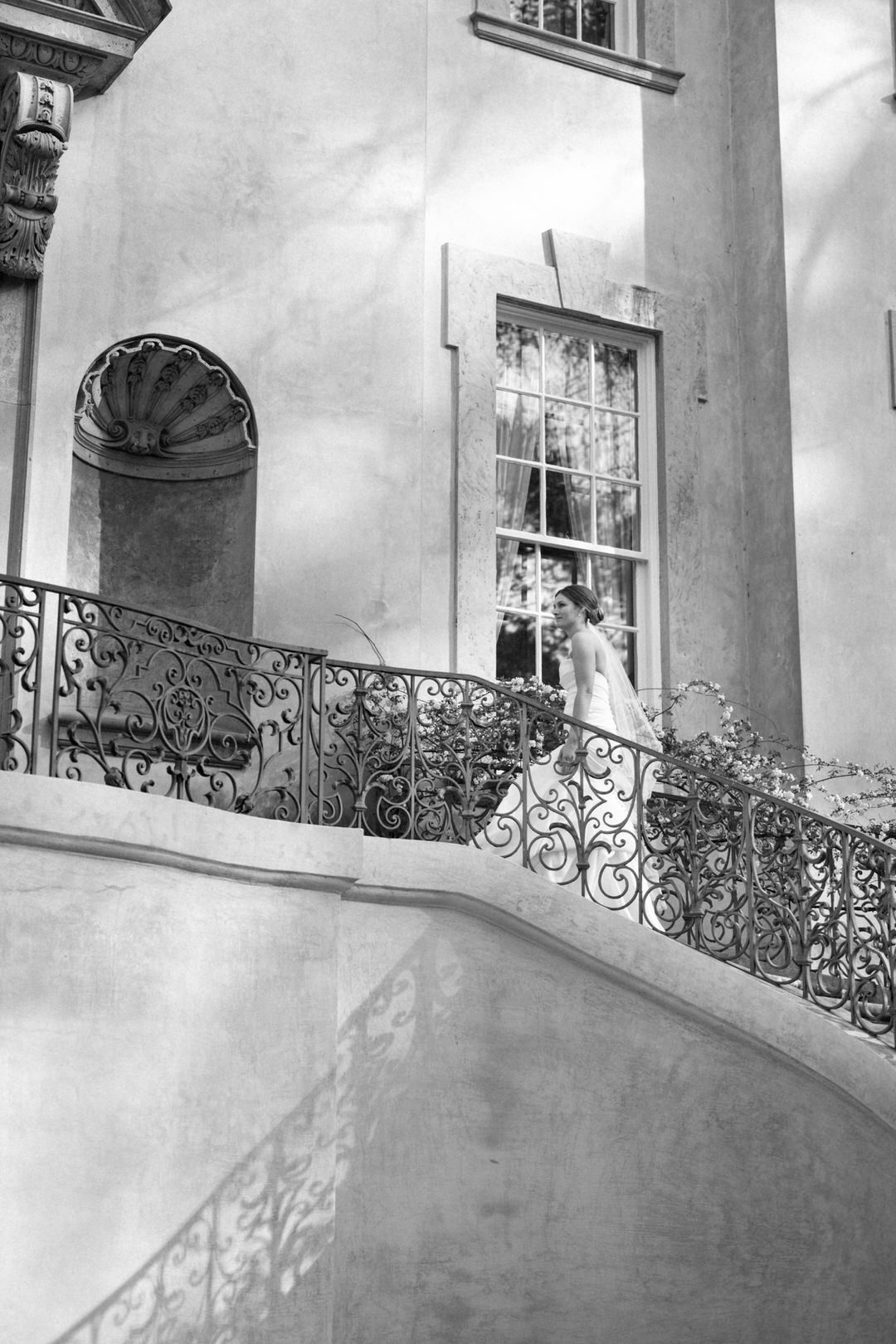 bride walking up stairs at The Swan House Atlanta GA