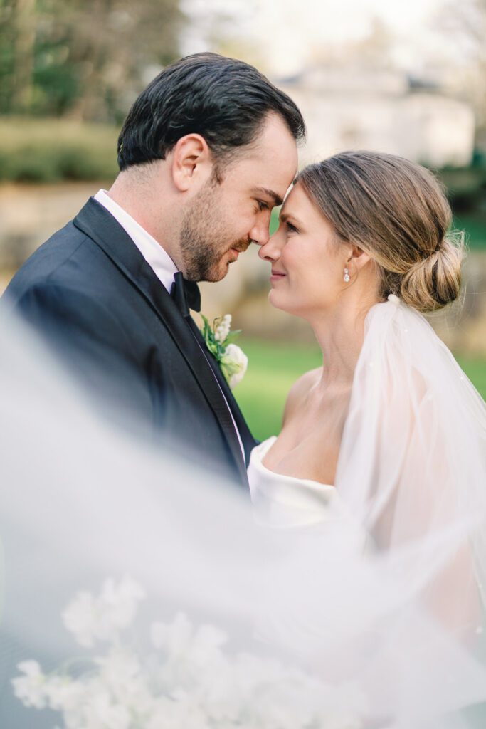 bride and groom nose to nose