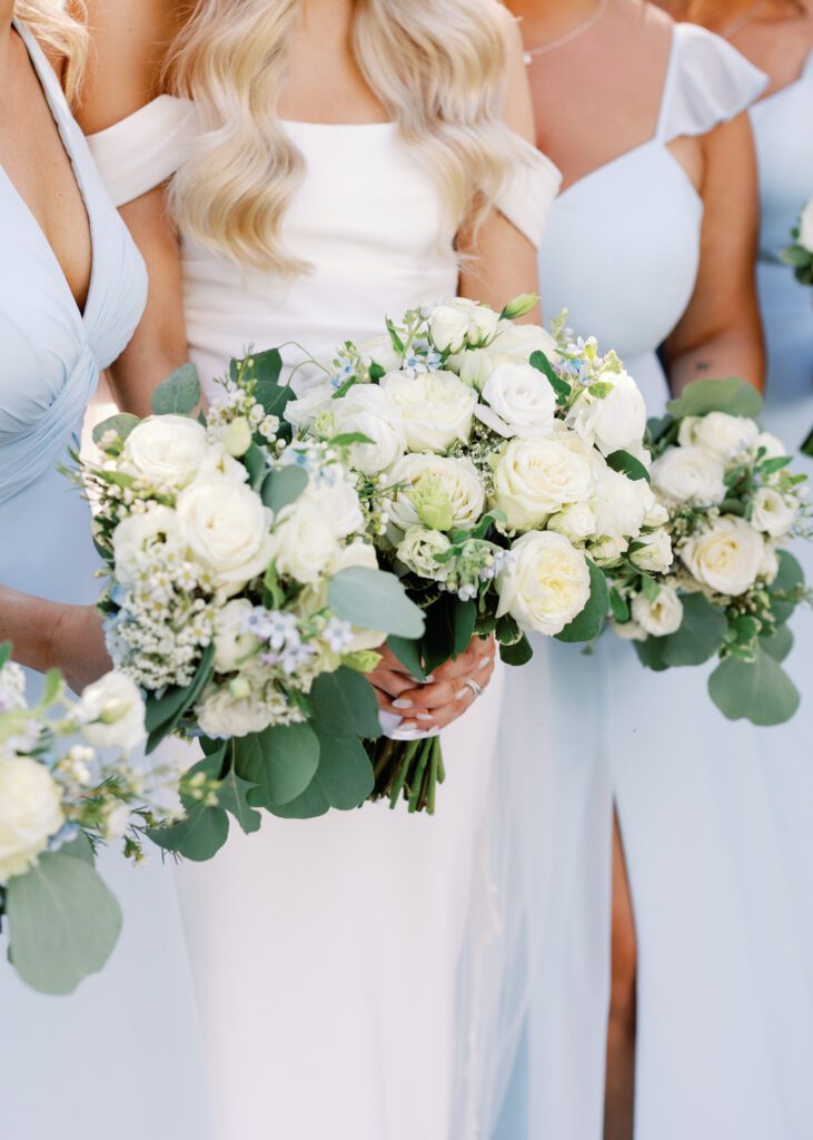 bridesmaids holding bouquets