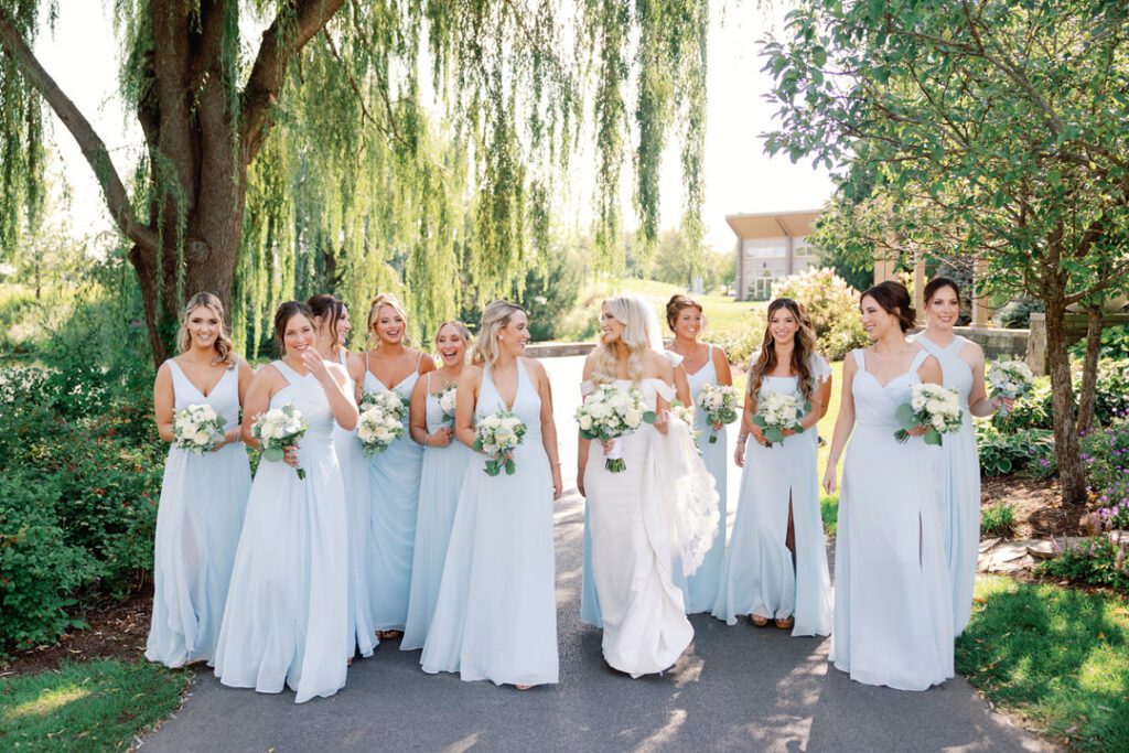 bride walking with bridesmaids