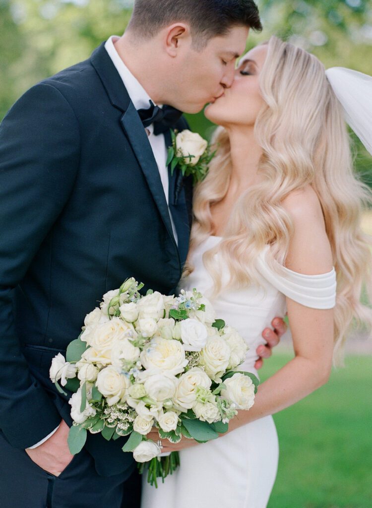 bride and groom kissing