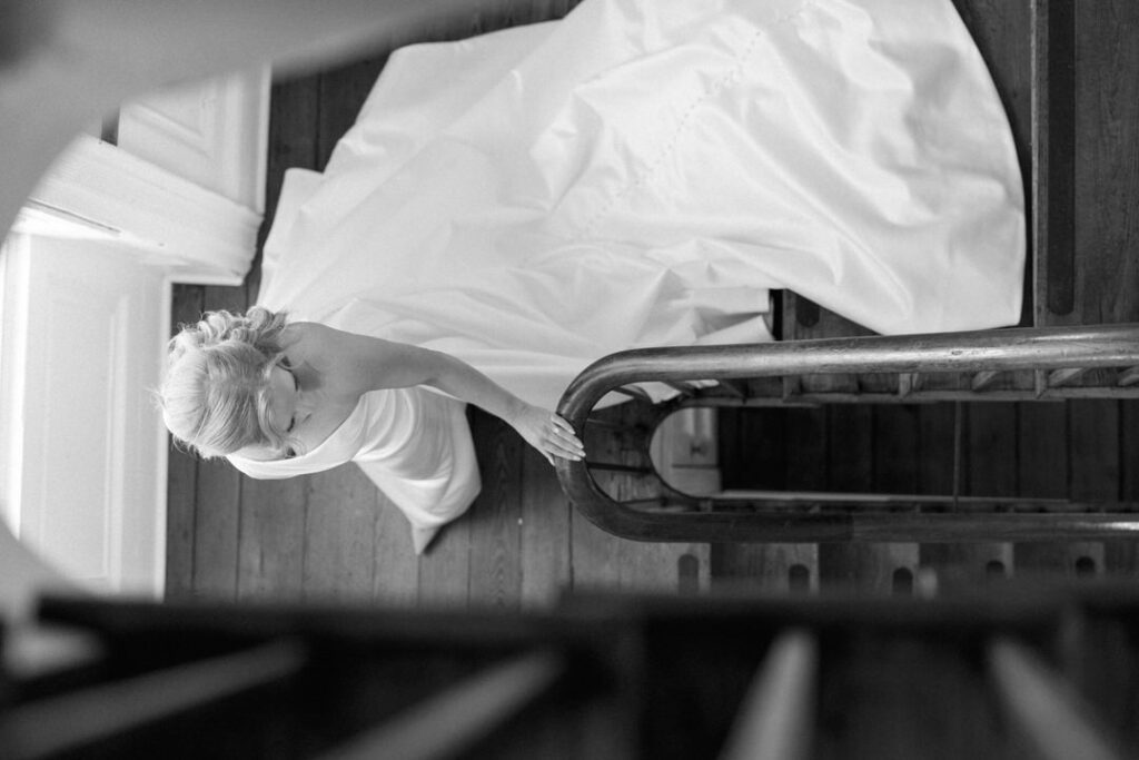 William Aiken House Photos Bride walking down stairs