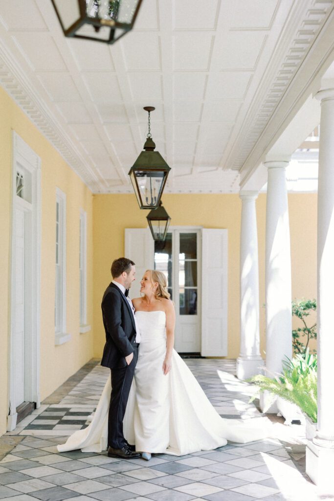 bride and groom smiling at William Aiken House Photos