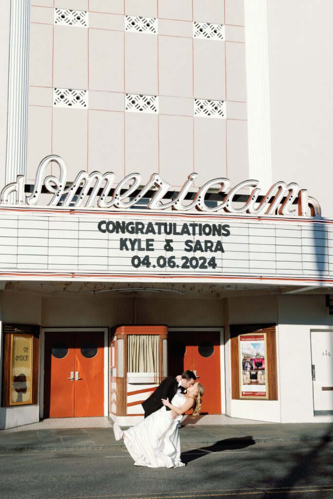 bride and groom under marquee at The American