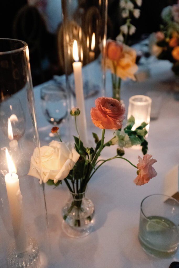 flowers and candles on table