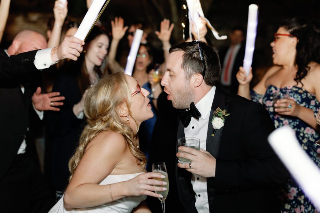 bride and groom singing and dancing