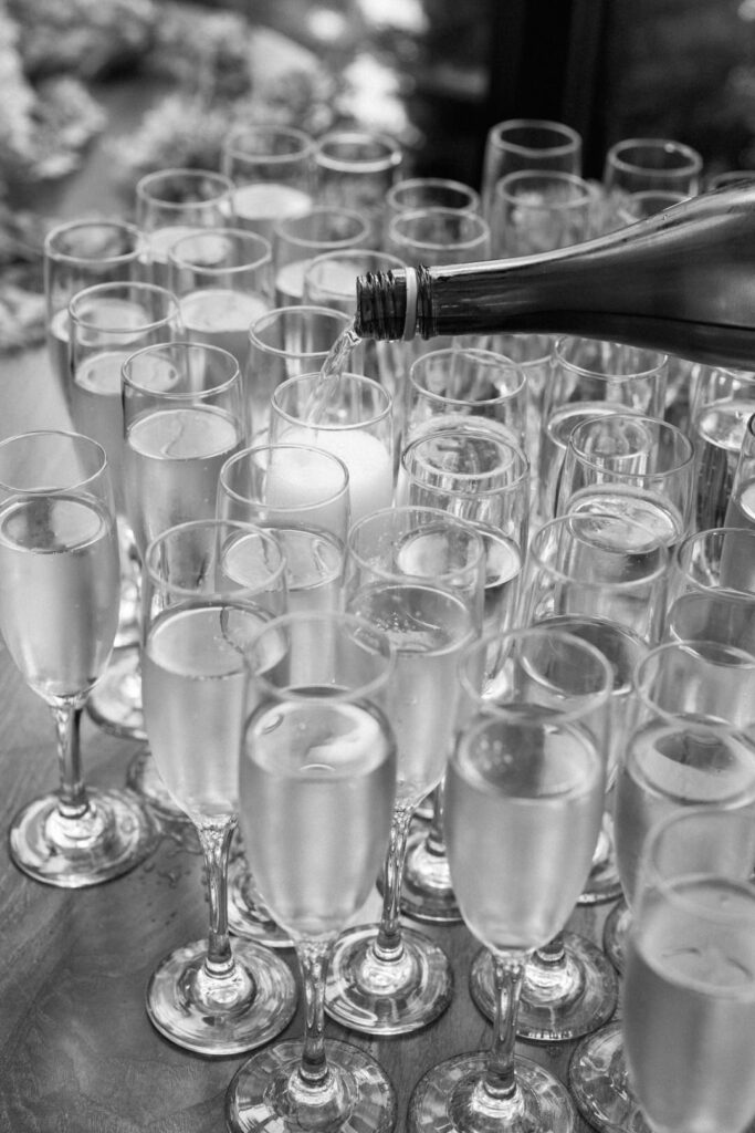 black and white of champagne glasses