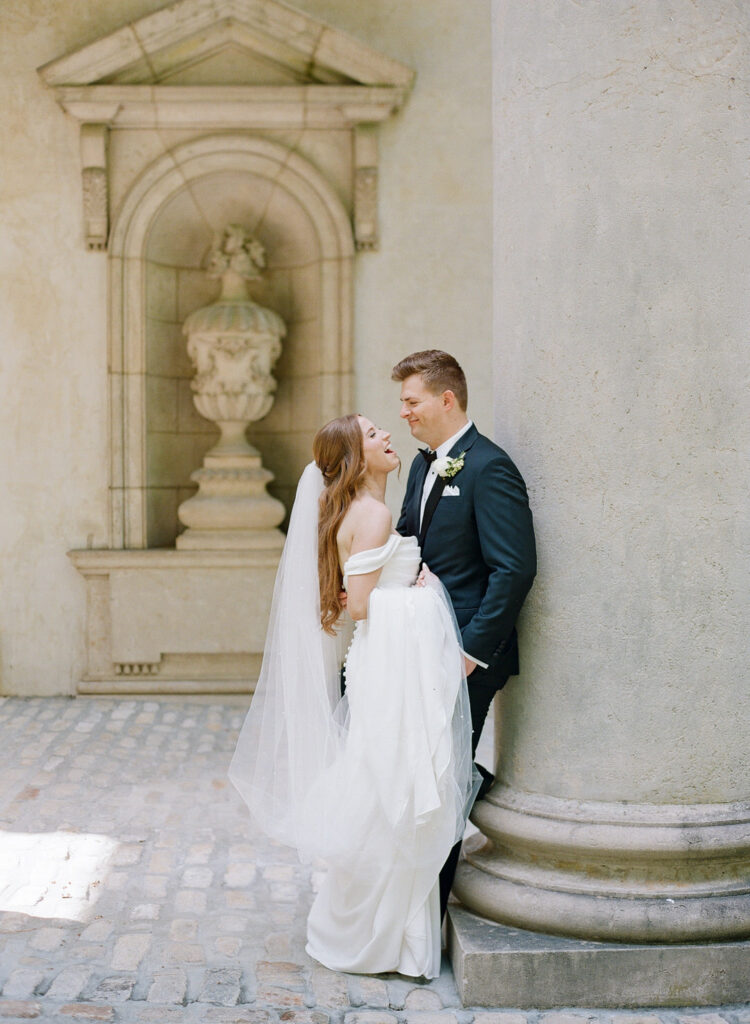 bride and groom laughing