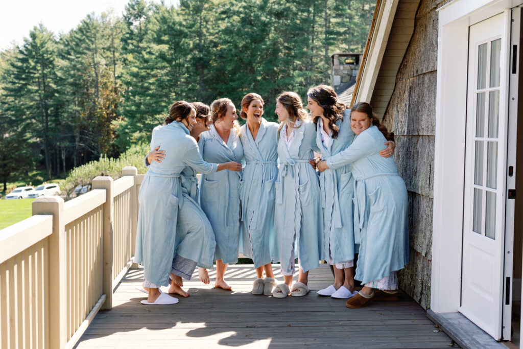 bride with bridesmaids in robes