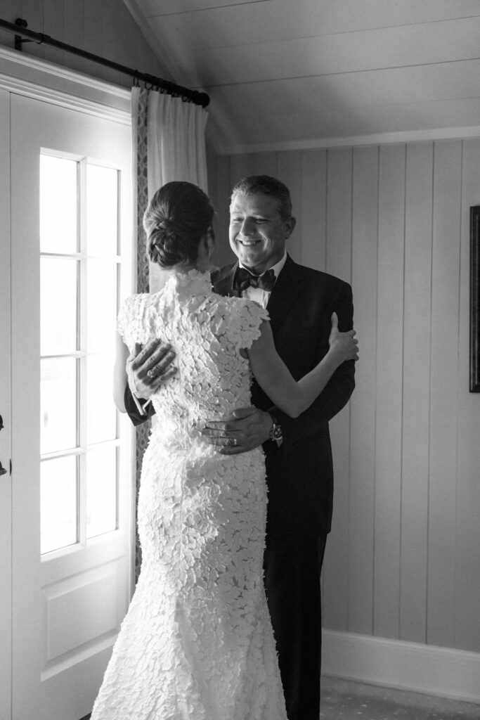 black and white of bride with her dad