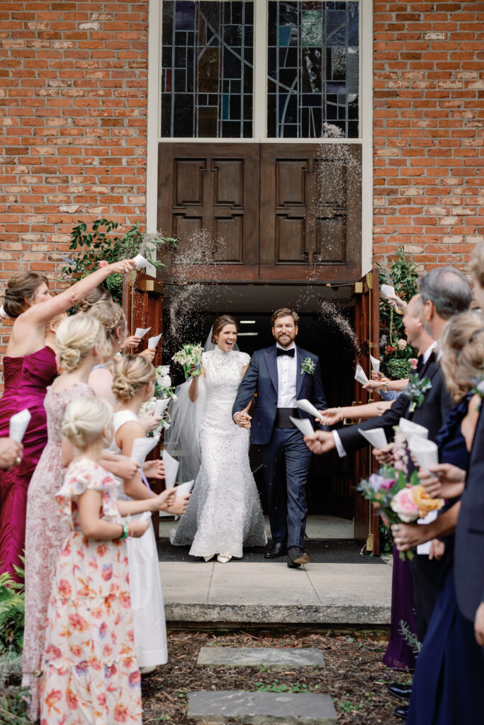 bride and groom lavender toss exit from church