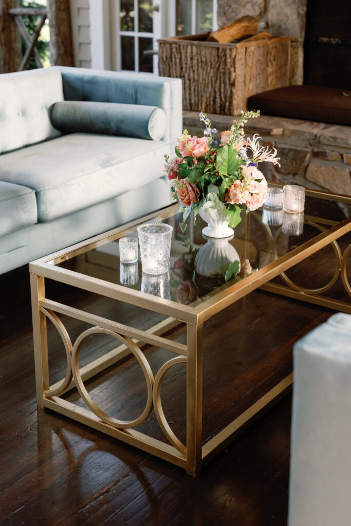 lounge area with table and flowers