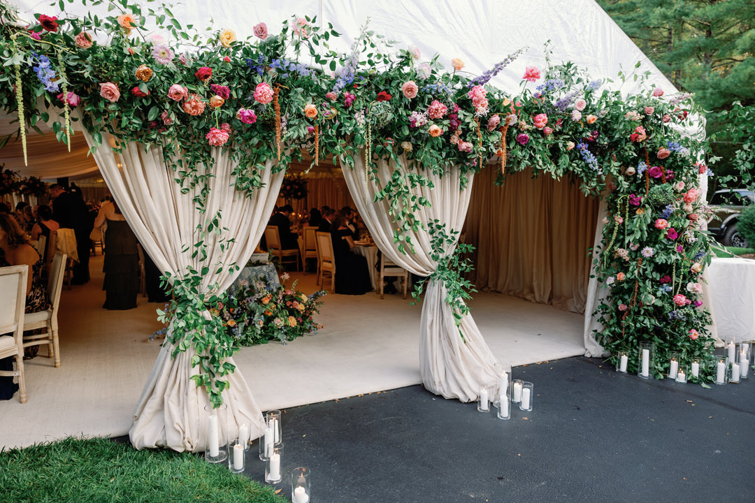 tented wedding reception with flowers at Chattooga Club in Cashiers NC