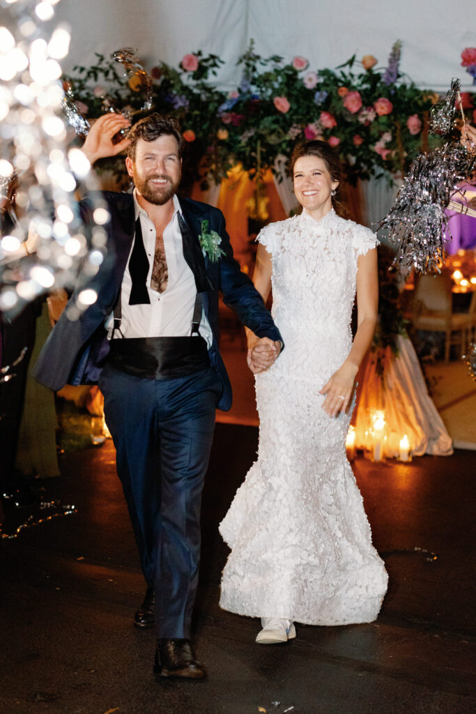 bride and groom exit wedding reception