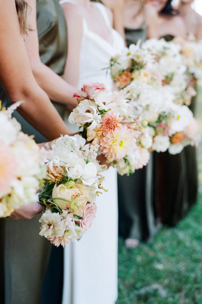 bride and bridesmaids holding bouquets