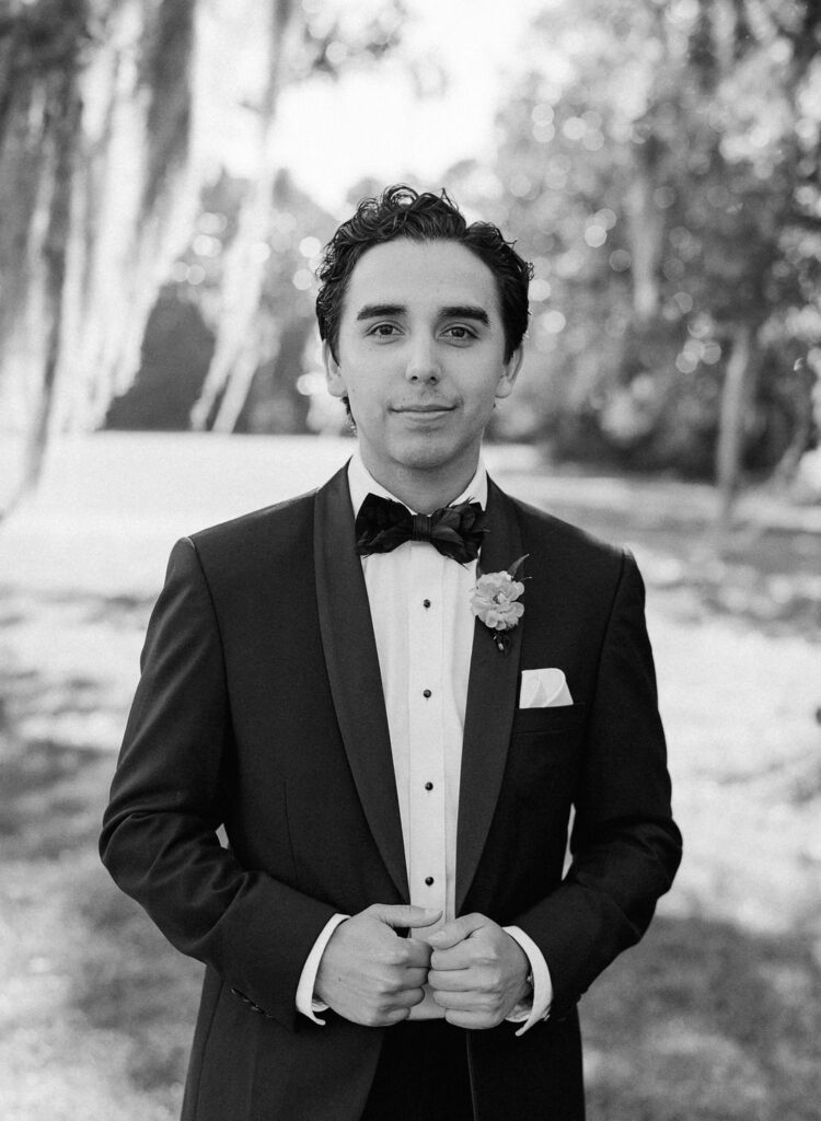 black and white of groom