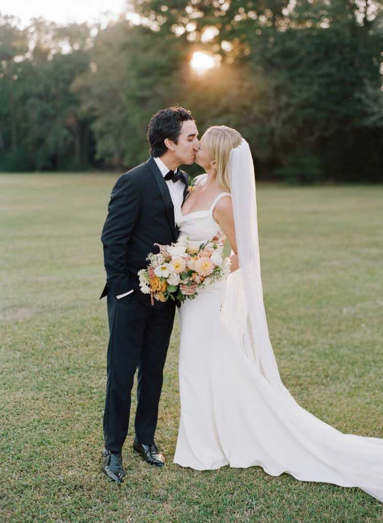 bride and groom kissing