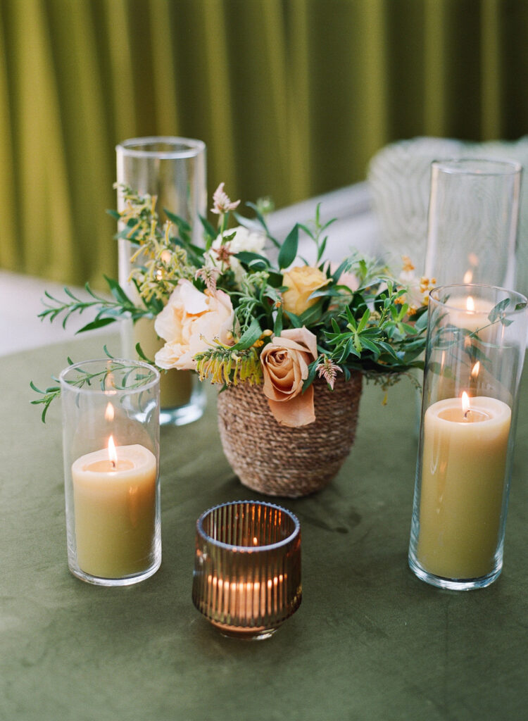 Flowers and candles on table