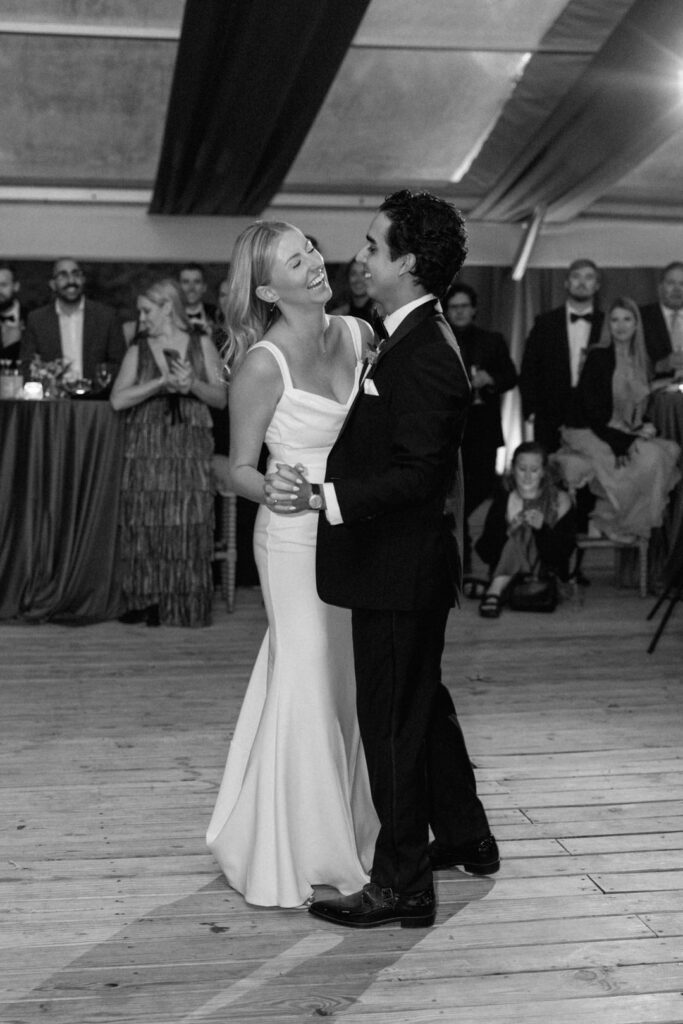 black and white of bride and groom first dance