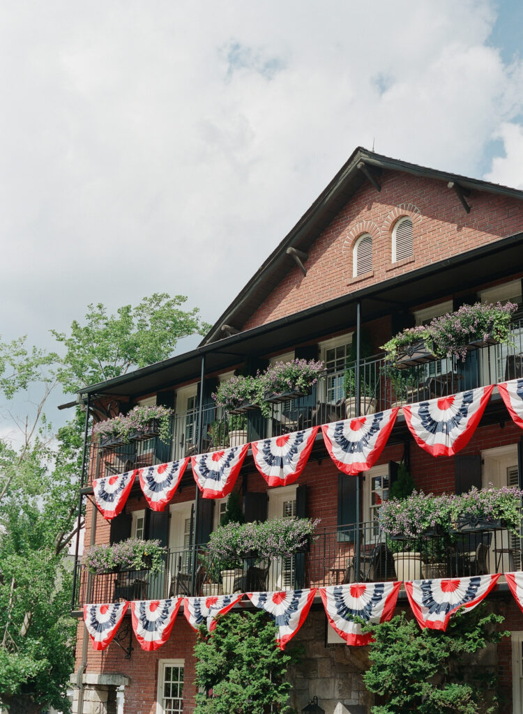 Old Edwards Inn with American Flag Bunting on the rails of the balconies