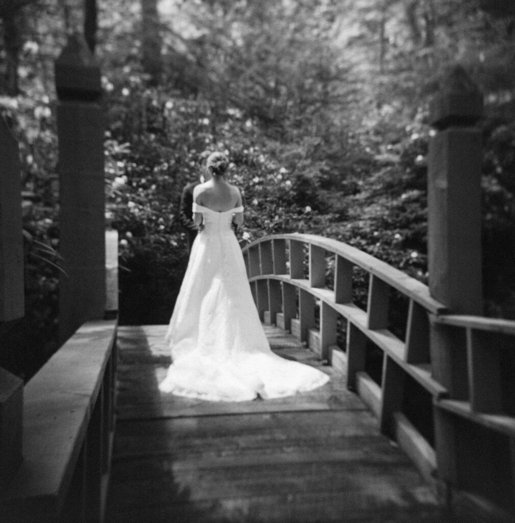 First look with the bride and groom on the bridge at Old Edwards Inn in Highlands NC