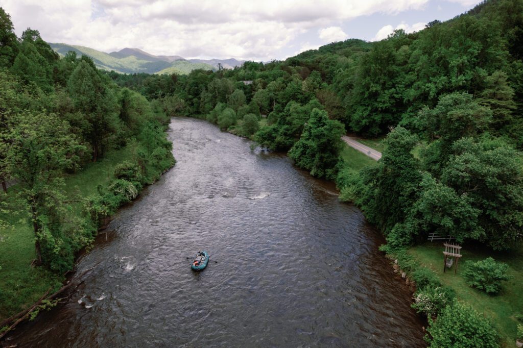 fishing boat floating down the river