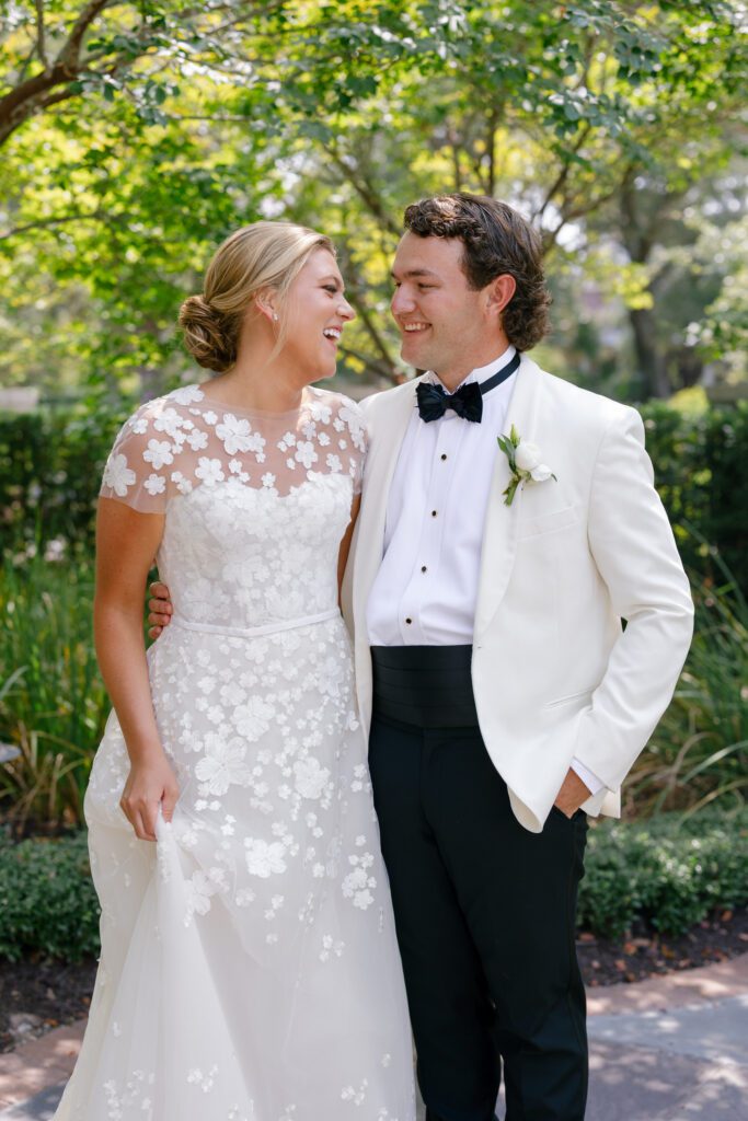 bride and groom laughing 