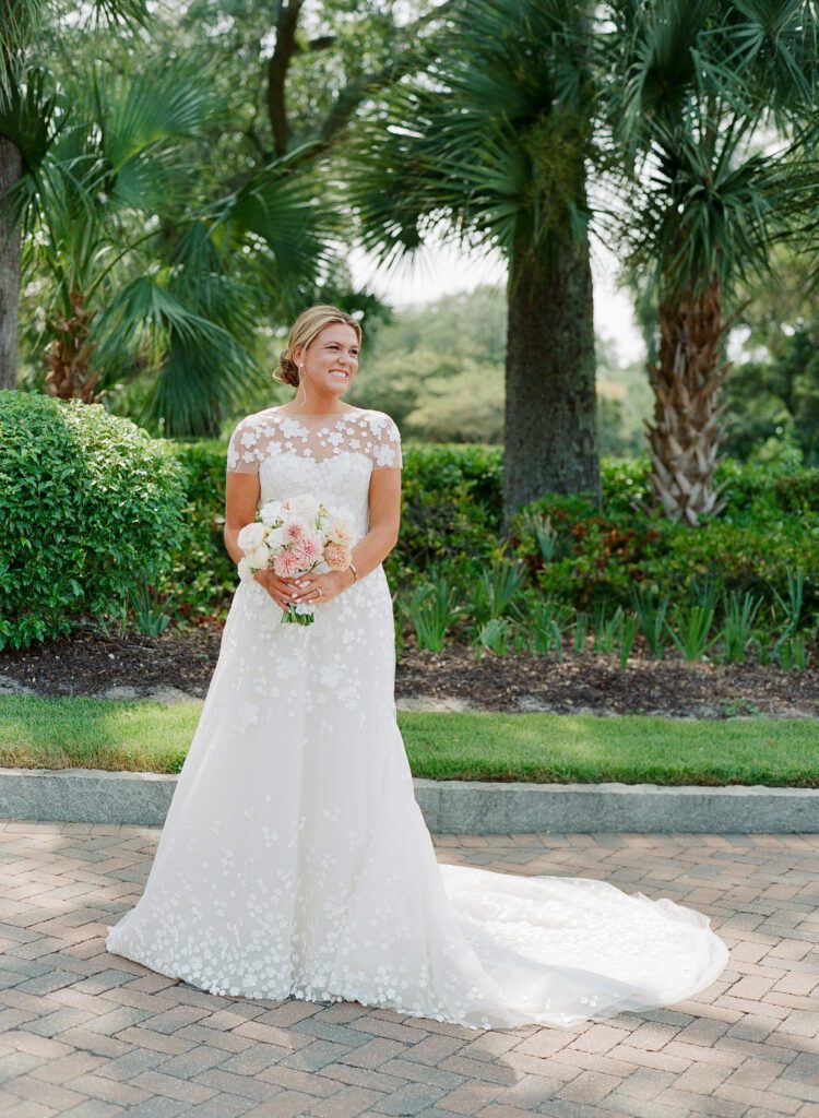 Bride holding flowers at the sanctuary at Kiawah 